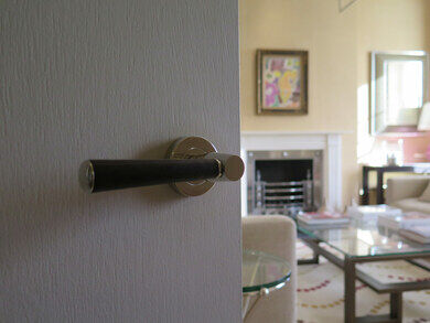 Leather wrapped “Turnstyle” lever handle c/o Somerset Place, Bath 