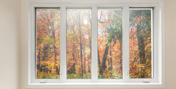 Large,Four,Pane,Window,Looking,On,Colorful,Fall,Forest